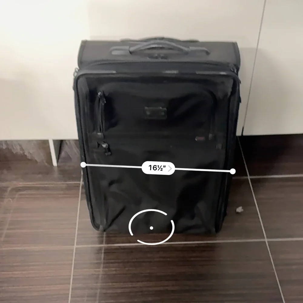 Tumi Black Rolling Carry-On Travel Bag